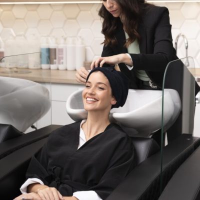 woman-getting-treatment-hairdresser-shop-4-1-683x1024